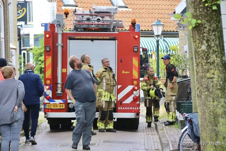 Brand in wasmachine in Den Burg